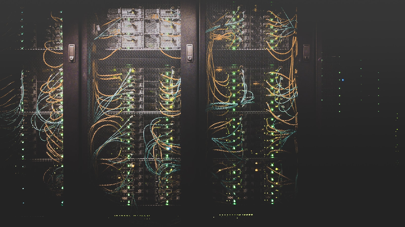 Rows of server racks in a data hall.